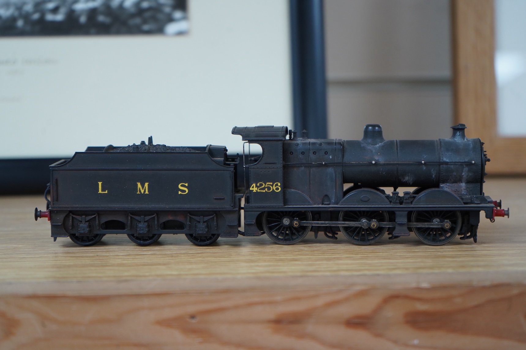 Two kit built and adapted EM gauge LMS railway locomotives; an 0-8-0, 9518, and an 0-6-0 class 4F based on an Airfix kit, together with the body only of an SR Schools Class